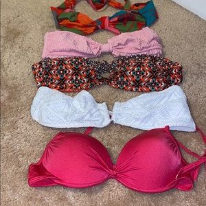 5 bathing suit tops and 2 bottoms.